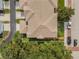 Aerial view showcasing the roof, greenery, and driveway of the property at 311 1St Sw Ave, Largo, FL 33770