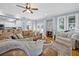 Comfortable living room with ample seating, light blue walls, and hardwood floors at 311 1St Sw Ave, Largo, FL 33770