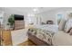 Spacious main bedroom with ceiling fan, hardwood floors, and lots of light at 311 1St Sw Ave, Largo, FL 33770