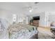Bright bedroom with doorway into bath and hardwood floors at 311 1St Sw Ave, Largo, FL 33770
