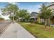 Street view showcasing the buildings with sidewalks and landscaping in the neighborhood at 311 1St Sw Ave, Largo, FL 33770