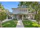 Charming two-story home with a welcoming front porch and well-maintained landscaping at 3114 W Granada St, Tampa, FL 33629