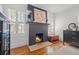 This unique fireplace has a decorative mantle, hearth and black painted brick at 3114 W Granada St, Tampa, FL 33629