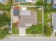 Aerial view of the property showing the entire perimeter and surrounding neighborhood at 3145 Domino Dr, Holiday, FL 34691