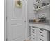 Craft room features drawers, granite countertop, and ample space for crafting at 31921 Magna Gulf Loop, San Antonio, FL 33576