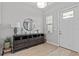 Entryway featuring a decorative mirror and a console table at 31921 Magna Gulf Loop, San Antonio, FL 33576