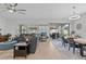 Living room area with a sliding door leading to outdoor seating at 31921 Magna Gulf Loop, San Antonio, FL 33576