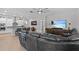 Living room with modern decor, leading to the kitchen area at 31921 Magna Gulf Loop, San Antonio, FL 33576