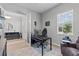 Well-lit office space featuring a modern desk, comfortable chair, and neutral decor at 31921 Magna Gulf Loop, San Antonio, FL 33576