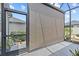Screened-in patio showing outdoor privacy screen for shade and privacy at 31921 Magna Gulf Loop, San Antonio, FL 33576