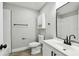 This bathroom features modern cabinets, black hardware, a toilet, and a tiled shower and a modern sink at 3515 41St S Ter # 224, St Petersburg, FL 33711