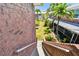 Exterior view of the brick building with manicured lawn and walkways leading to other units at 3515 41St S Ter # 224, St Petersburg, FL 33711
