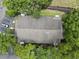 Aerial view showing roof and surrounding greenery at 4004 Dream Oak Pl # 102, Tampa, FL 33613