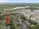 Aerial view of property and its surrounding neighborhood and pond at 4004 Dream Oak Pl # 102, Tampa, FL 33613