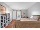 Bright bedroom features a window, bookcase, and minimalist decor at 4004 Dream Oak Pl # 102, Tampa, FL 33613
