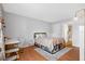 Bedroom with desk and chair, minimalist décor and wood floors at 4004 Dream Oak Pl # 102, Tampa, FL 33613