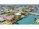 Waterfront home with a private dock and pool overlooking the canal in a coastal community at 403 Normandy Rd, Madeira Beach, FL 33708