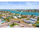 Charming waterfront home with lush landscaping, a private dock, and convenient street access at 403 Normandy Rd, Madeira Beach, FL 33708