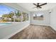 Light and airy bedroom with durable floors, large windows and beautiful waterfront views at 403 Normandy Rd, Madeira Beach, FL 33708