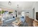 Bright and airy living room with comfortable seating and water views at 403 Normandy Rd, Madeira Beach, FL 33708