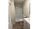 Standard bathroom with shower stall, toilet, and vanity with neutral color scheme at 5281 Venetian Ne Blvd, St Petersburg, FL 33703