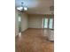 Open dining area with tile floor leading to exterior door and adjacent outdoor space at 5281 Venetian Ne Blvd, St Petersburg, FL 33703