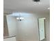 Open dining area with a chandelier and tile flooring at 5281 Venetian Ne Blvd, St Petersburg, FL 33703