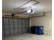 Garage with automatic door and storage at 5281 Venetian Ne Blvd, St Petersburg, FL 33703