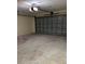 Spacious garage featuring an automatic door and ample room for parking and storage at 5281 Venetian Ne Blvd, St Petersburg, FL 33703