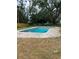 Backyard view of the fenced in pool at 5281 Venetian Ne Blvd, St Petersburg, FL 33703