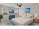 Bedroom showcasing neutral tones, stylish decor, and ample natural light from the windows at 6211 114Th E Dr, Parrish, FL 34219