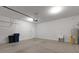 A clean and spacious garage with a utility sink and room for storage at 6211 114Th E Dr, Parrish, FL 34219