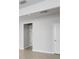 This light and bright hallway features a neutral color palette and ceramic tile floors at 6211 114Th E Dr, Parrish, FL 34219