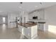 Modern kitchen featuring stainless steel appliances, granite countertops, and a large kitchen island at 6211 114Th E Dr, Parrish, FL 34219