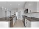 Well-equipped kitchen with stainless steel appliances, granite countertops, and ample cabinet space at 6211 114Th E Dr, Parrish, FL 34219