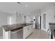 Modern kitchen featuring stainless steel appliances, granite countertops, and a kitchen island at 6211 114Th E Dr, Parrish, FL 34219