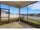 Enclosed lanai offers lovely lake views and a peaceful setting at 6211 114Th E Dr, Parrish, FL 34219