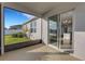 Covered patio offers an inviting view of the backyard and seamless transition to indoor living at 6211 114Th E Dr, Parrish, FL 34219