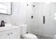 Bathroom featuring a new vanity, modern shower with glass enclosure, and updated fixtures at 6304 Memorial Hwy, Tampa, FL 33615
