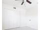 Bedroom featuring a ceiling fan and bi-fold closet doors at 6304 Memorial Hwy, Tampa, FL 33615