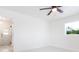 Bright bedroom featuring an en-suite bathroom with a glass walk-in shower and modern fixtures at 6304 Memorial Hwy, Tampa, FL 33615