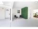 Inviting covered patio with stylish seating and a modern green wall feature at 6304 Memorial Hwy, Tampa, FL 33615
