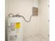 View of the water heater and breaker box in a utility area at 6304 Memorial Hwy, Tampa, FL 33615