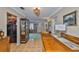 Open-concept dining room featuring tile floors, a large table, and seamless flow to other living spaces at 6401 15Th N St, St Petersburg, FL 33702