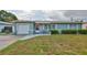 Charming single-story home featuring well-maintained landscaping and inviting curb appeal at 6401 15Th N St, St Petersburg, FL 33702