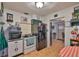 Functional kitchen features practical appliances and tiled floor at 6401 15Th N St, St Petersburg, FL 33702
