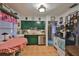 Functional kitchen with colorful cabinets and ample space for dining at 6401 15Th N St, St Petersburg, FL 33702