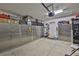 Spacious garage featuring wall-mounted storage cabinets at 6512 Trent Creek Dr, Sun City Center, FL 33573