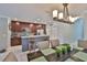 Inviting kitchen with breakfast bar and dining area offering ample seating and natural light at 6512 Trent Creek Dr, Sun City Center, FL 33573