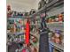 Walk-in pantry features wire shelving that is stocked full of cooking essentials at 6512 Trent Creek Dr, Sun City Center, FL 33573